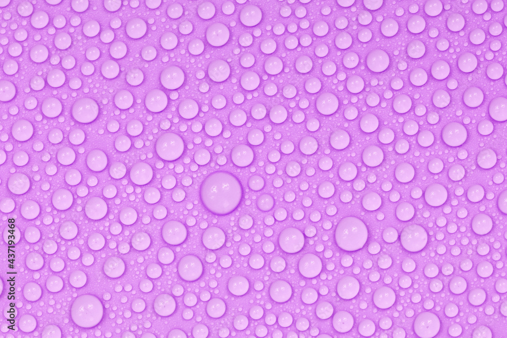 Water drops on purple background texture. Backdrop glass covered with drops of water. violet bubbles in water Water drops on purple background texture. Backdrop glass covered with drops of water. violet bubbles in water