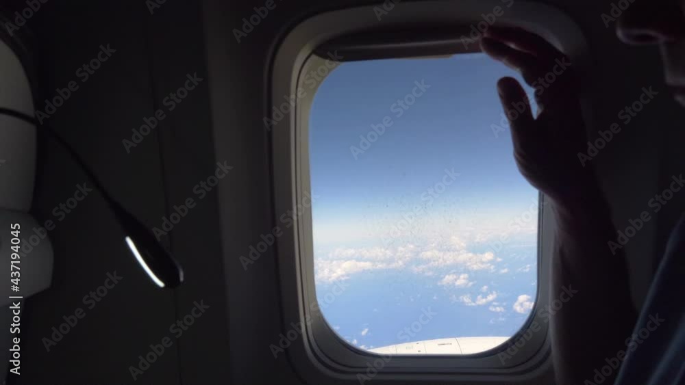 Revealing the window on the plane in 4k slow motion 60fps Revealing the window on the plane in 4k slow motion 60fps