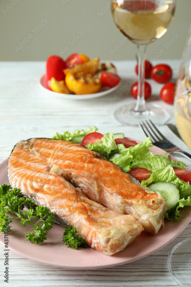 Concept of tasty eating with grilled salmon, close up Concept of tasty eating with grilled salmon, close up