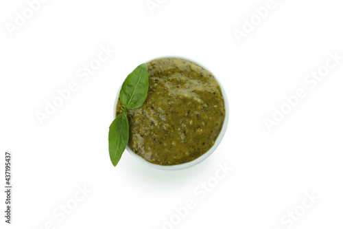 Bowl of Pesto sauce isolated on white background