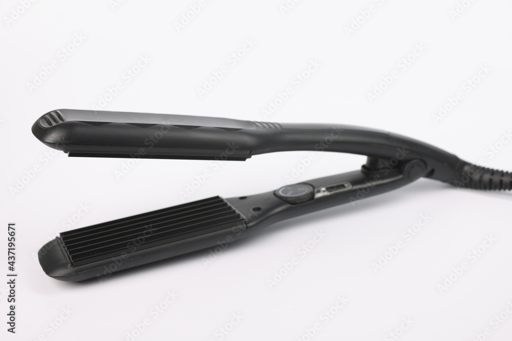 Hair corrugation iron a on white background Hair corrugation iron a on white background