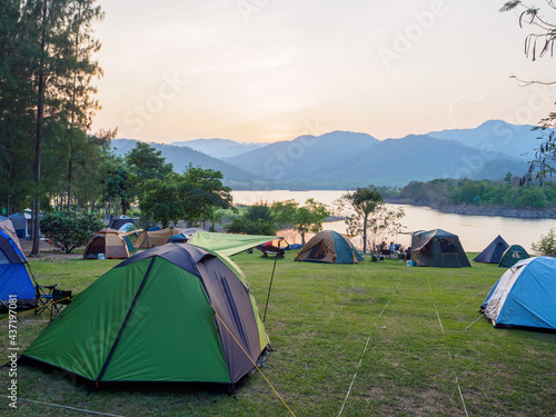 Camping and tent near lake in sunset at Ang Kep Nam Tha Khoei, Ratchaburi, Thailand