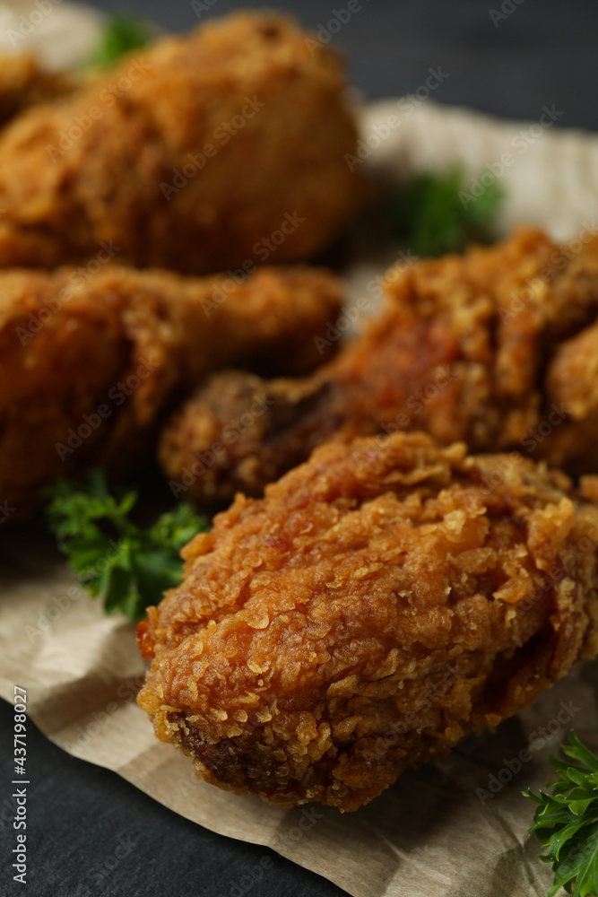 Concept of tasty eating with fried chicken, close up Concept of tasty eating with fried chicken, close up