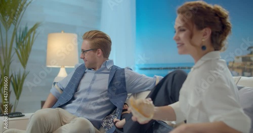 The footage was filmed in a purpose-built video studio scenery. Romantic story of a young family. Young and stylish man and woman on vacation by the sea.
