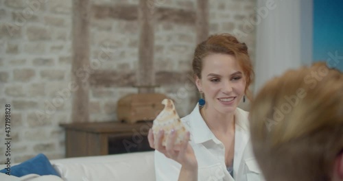 The footage was filmed in a purpose-built video studio scenery. Romantic story of a young family. Young and stylish man and woman on vacation by the sea.