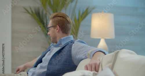 The footage was filmed in a purpose-built video studio scenery. Romantic story of a young family. Young and stylish man and woman on vacation by the sea.