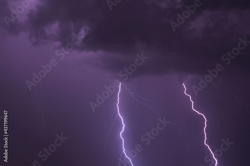night sky with two strokes of lightning