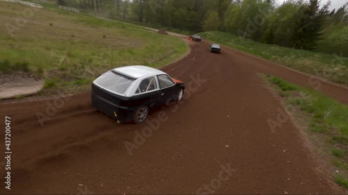 Junk car rally chased by FPV drone photo