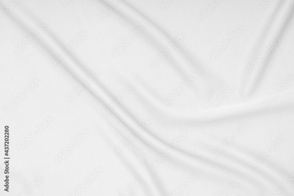 Abstract soft waves of white silk fabric, satin, cloth surface, white fabric texture background.