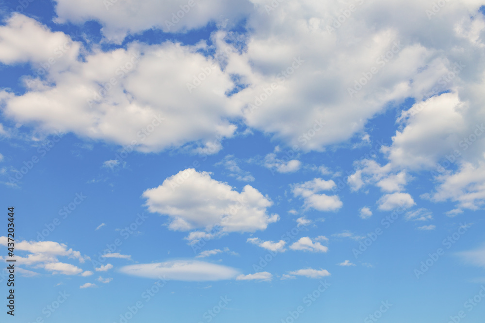 White clouds in the blue sky on sunny day White clouds in the blue sky on sunny day