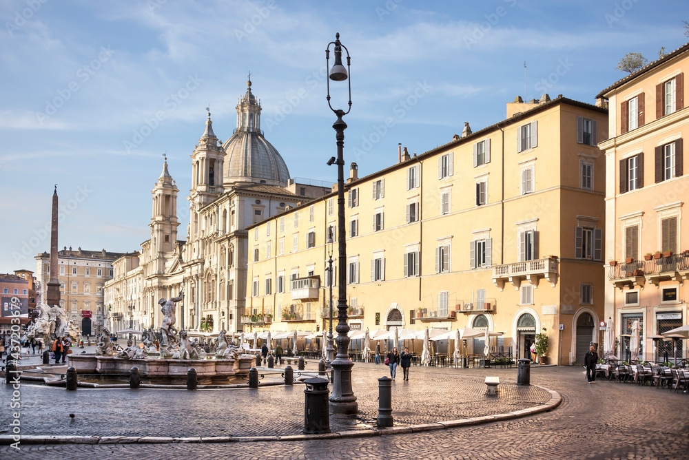 Tourists visiting the fountains in the Piazza Navona