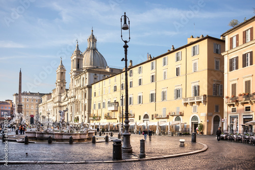 Tourists visiting the fountains in the Piazza Navona