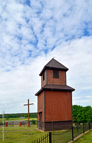 Built in 1925, a historic wooden Catholic church dedicated to Saint Roch in the village of Leman in Podlasie, Poland. There is also a historic wooden belfry next to the church. © Jacek Sakowicz