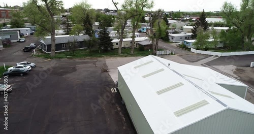 Looking through a desperately poor trailer park. Drone 4k 60p. photo