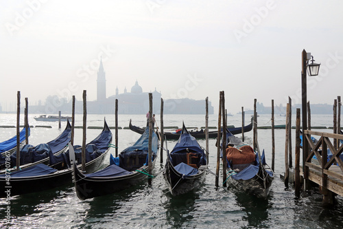 Romantic view of gondolas and grand canal of Venice.