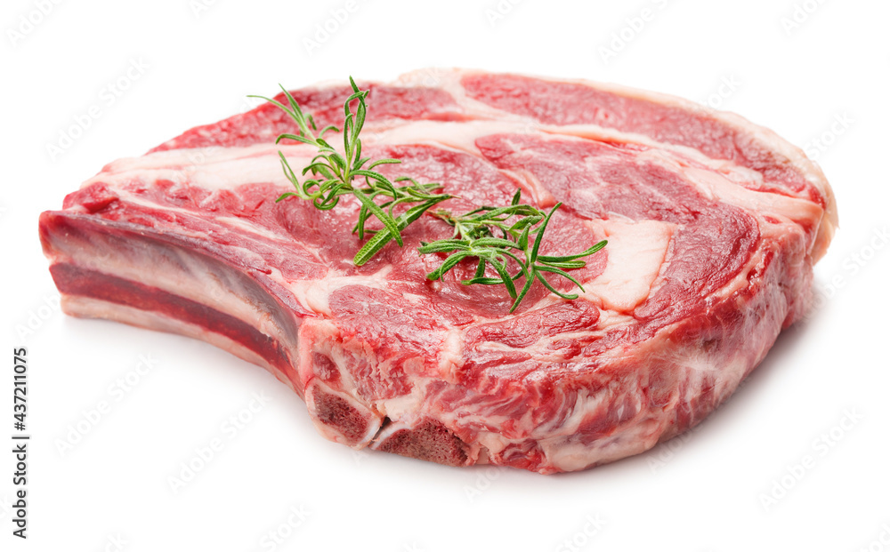 big raw rib-eye steak with rosemary twig isolated on white background
