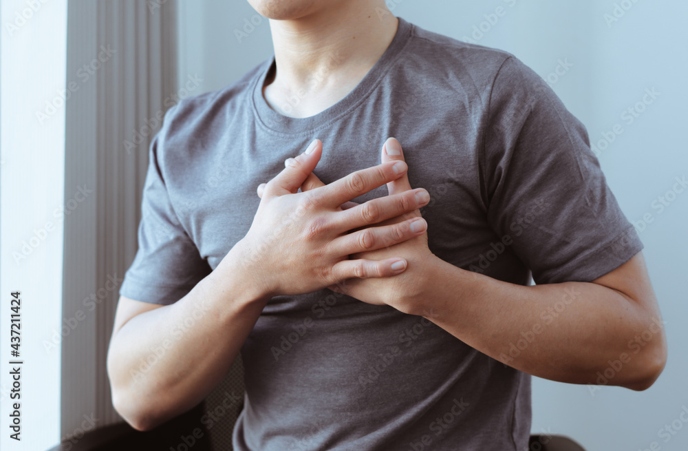 Healthcare concept, A man has severe heart pain and chest pain suffocating. Healthcare concept, A man has severe heart pain and chest pain suffocating.