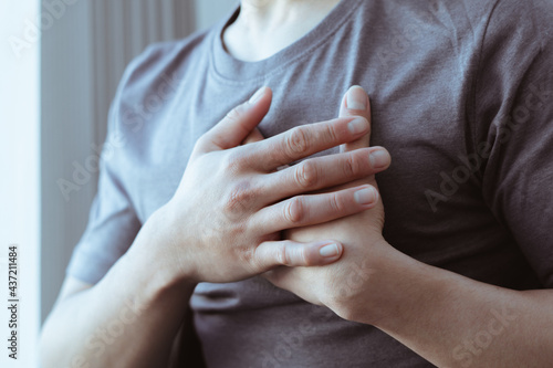Fotografía Healthcare concept, A man has severe heart pain and chest pain suffocating