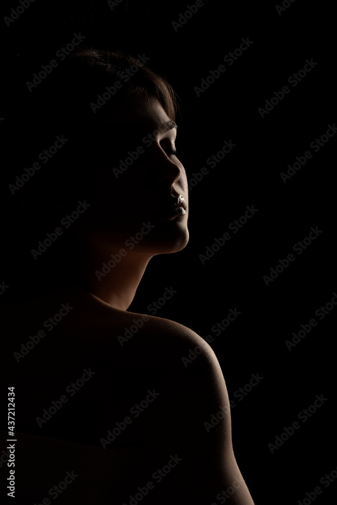  silhouette of a young beautiful woman
