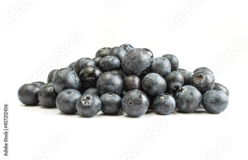 Pile of blueberries isolated on white abckground. Delicious wild berries