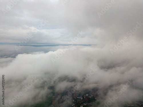 Aerial high flight above the clouds.