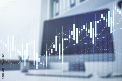 Multi exposure of abstract financial graph and modern desktop with pc on background, financial and trading concept