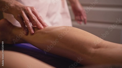 Wallpaper Mural Foot massage. Masseuse massages calf muscle to woman patient in spa salon. Close-up. Torontodigital.ca
