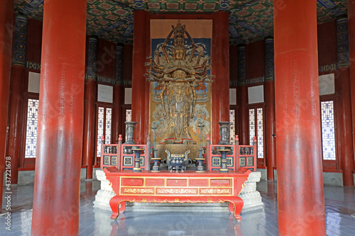 Thousand handed Avalokitesvara in the Buddhist Pavilion of the summer palace in Beijing photo