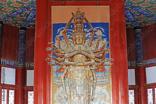 Thousand handed Avalokitesvara in the Buddhist Pavilion of the summer palace in Beijing photo