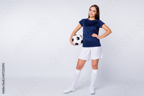Full length body size view of her she nice-looking attractive lovely pretty cheerful content straight-haired girl coach holding in hand ball isolated on light white gray pastel color background
