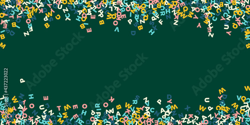 Falling letters of English language. Pastel flying words of Latin alphabet. Foreign languages study concept. Remarkable back to school banner on blackboard background.