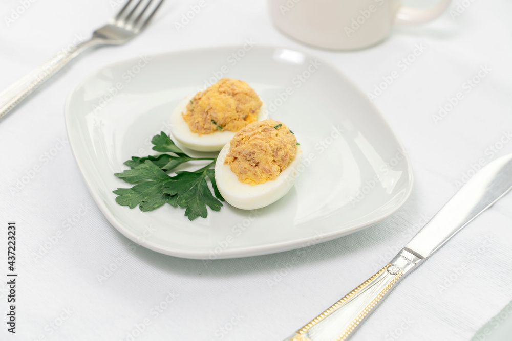 stuffed eggs with canned tuna and herbs