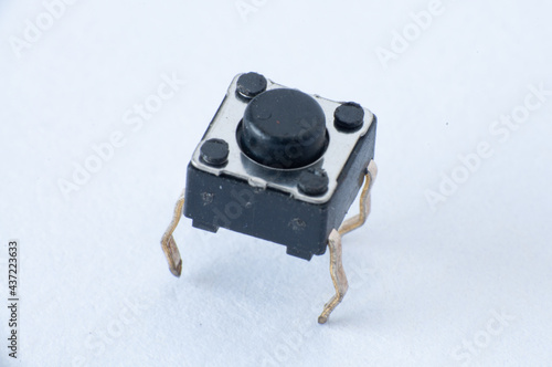Marco of Tactile button switch isolated on white background.