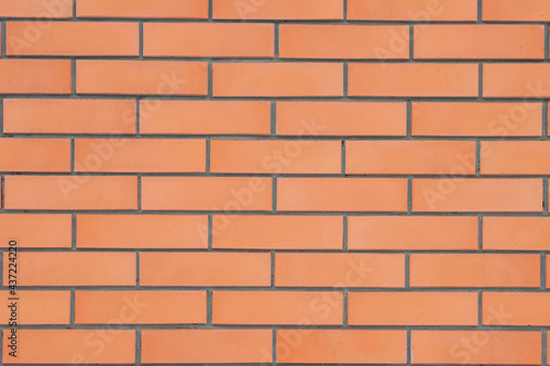 New red cladding brick masonry, mid-shot. Background image.