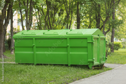 Covered container for construction and household waste
