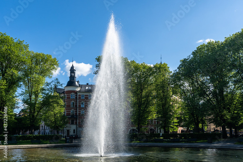 Stockholm fountains. The jets of the fountain in the rays of the sun. Water droplets glow in the sunlight.