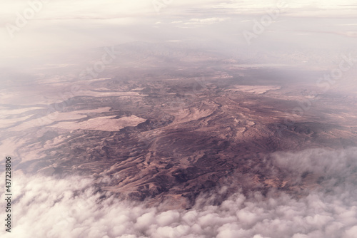 Aerial view of the Arizona desert. Clouds over the mountains near San Carlos, San Carlos Apache Indian Reservation, Gila County, east of Phoenix, AZ, USA. photo