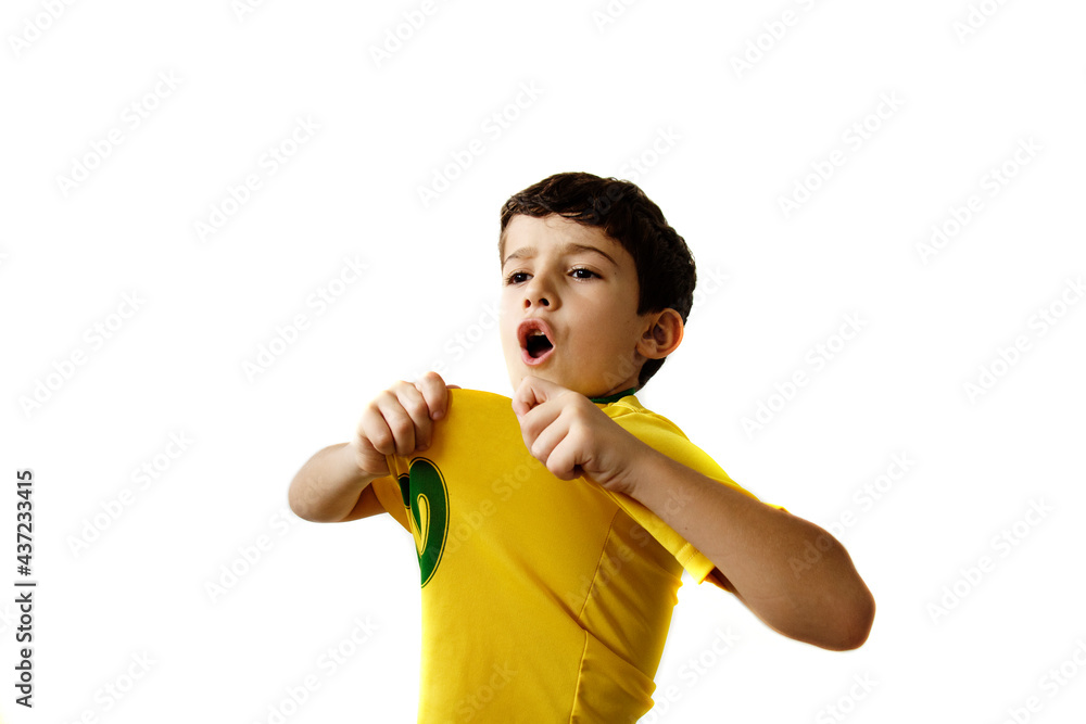 Brazilian boy, soccer player and fan, celebrates making a gesture with his hands over white background. Sports fan cherring. Brazilian boy, soccer player and fan, celebrates making a gesture with his hands over white background. Sports fan cherring.