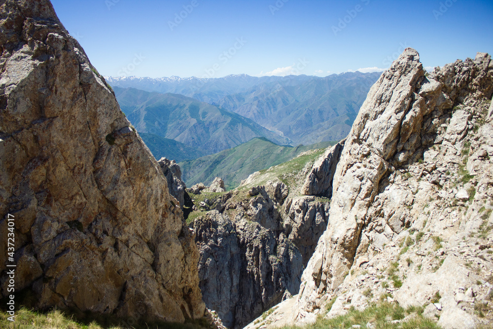 view from the mountain through the rocks