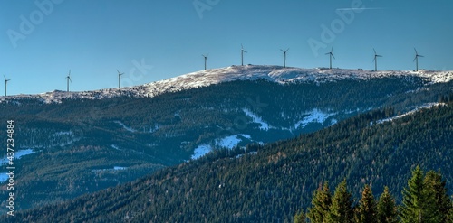 panorama of the mountains with wind turbines