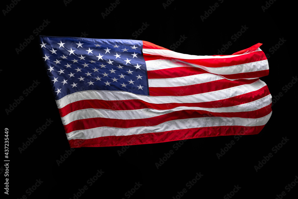 Obraz premium Flag of the USA isolated over dark black background. Memorial Day, Labour Day, Independence Day public holidays.