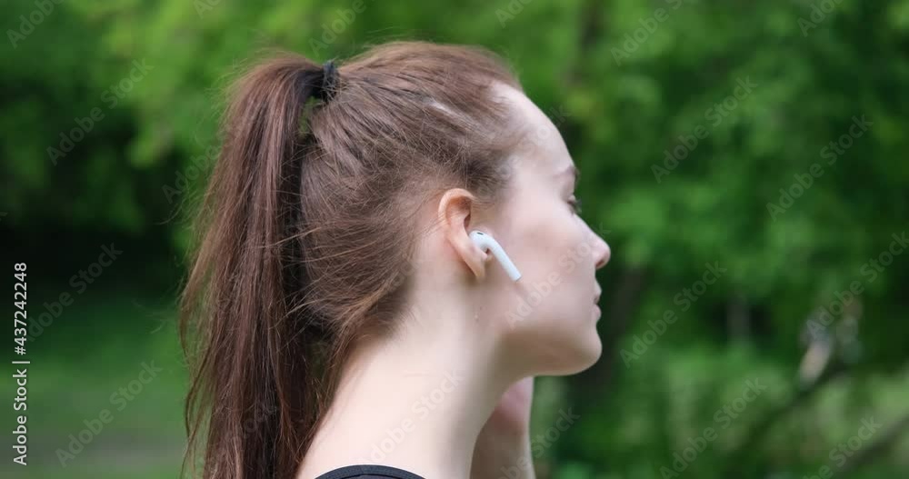 Fitness Woman Wearing Earphones Enjoying Music Fitness Woman Wearing Earphones Enjoying Music