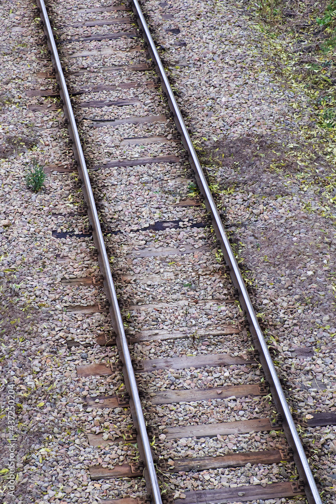 Railway bed. Fragment of railway tracks, top view, rails and sleepers. Railway bed. Fragment of railway tracks, top view, rails and sleepers.