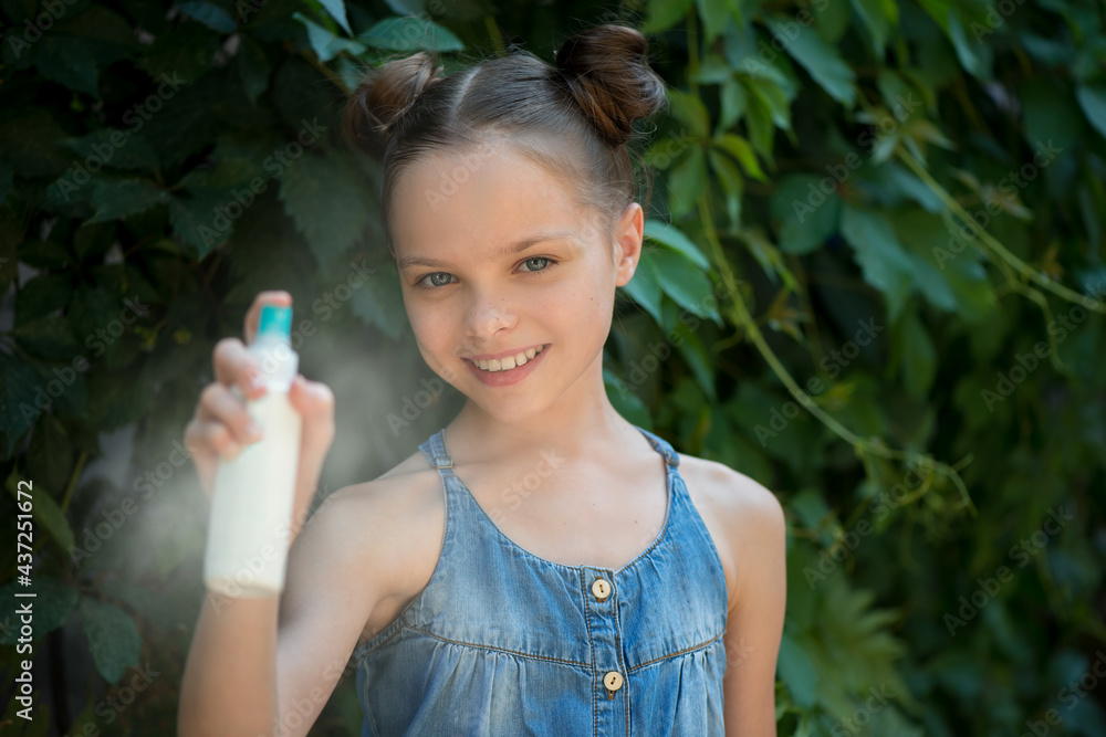 Portrait of beautiful little girl with white clean bottle of protection spray. Portrait of beautiful little girl with white clean bottle of protection spray.