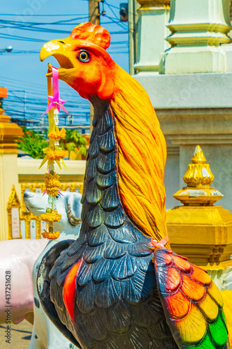 Chicken Wat Don Mueang Phra Arramluang buddhist temple Bangkok Thailand. photo