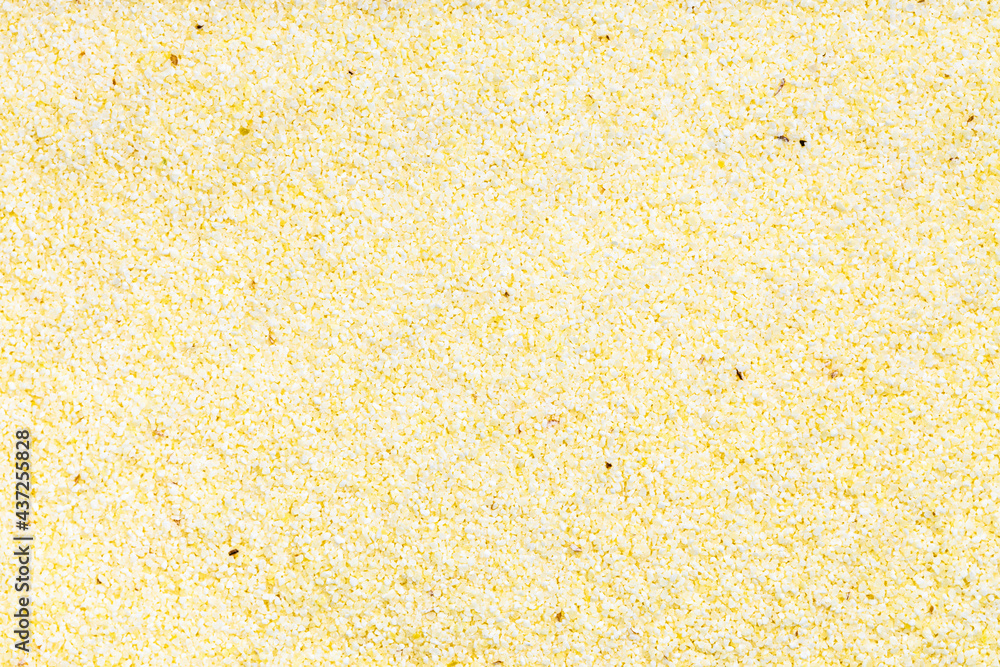 background - uncooked soft wheat manna groats background - uncooked soft wheat manna groats