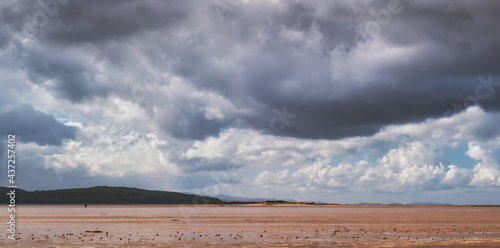 storm clouds over the sandy beach