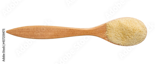 top view of granulated coconut sugar in wood spoon