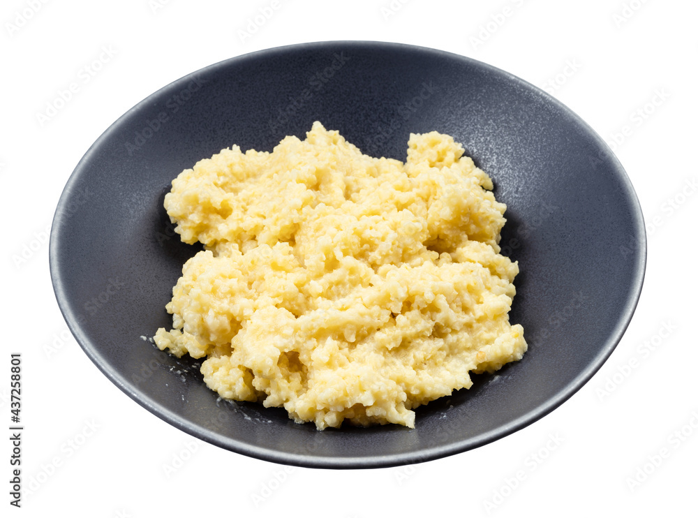 boiled porridge from proso millet groats in bowl boiled porridge from proso millet groats in bowl