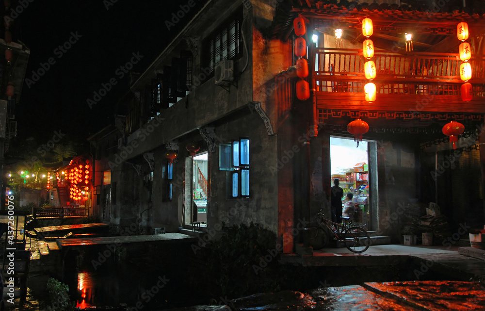 Xiao Likeng in Wuyuan County, Jiangxi Province, China. Xiao Likeng is an ancient town in Wuyuan County known for its Tang Dynasty architecture. View of the town at night with red lanterns